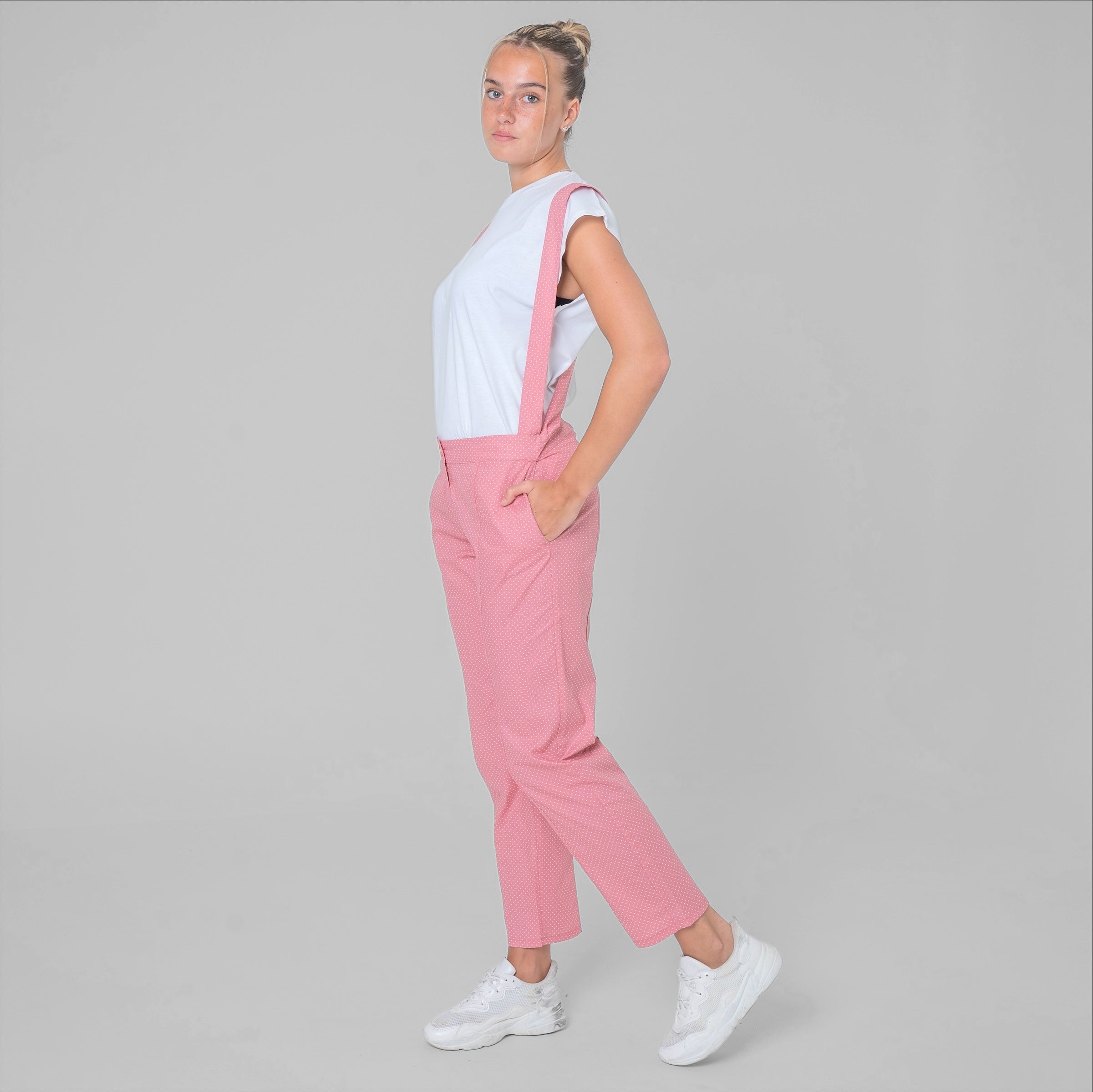 Pink cotton poplin suspender pants with white polka dots