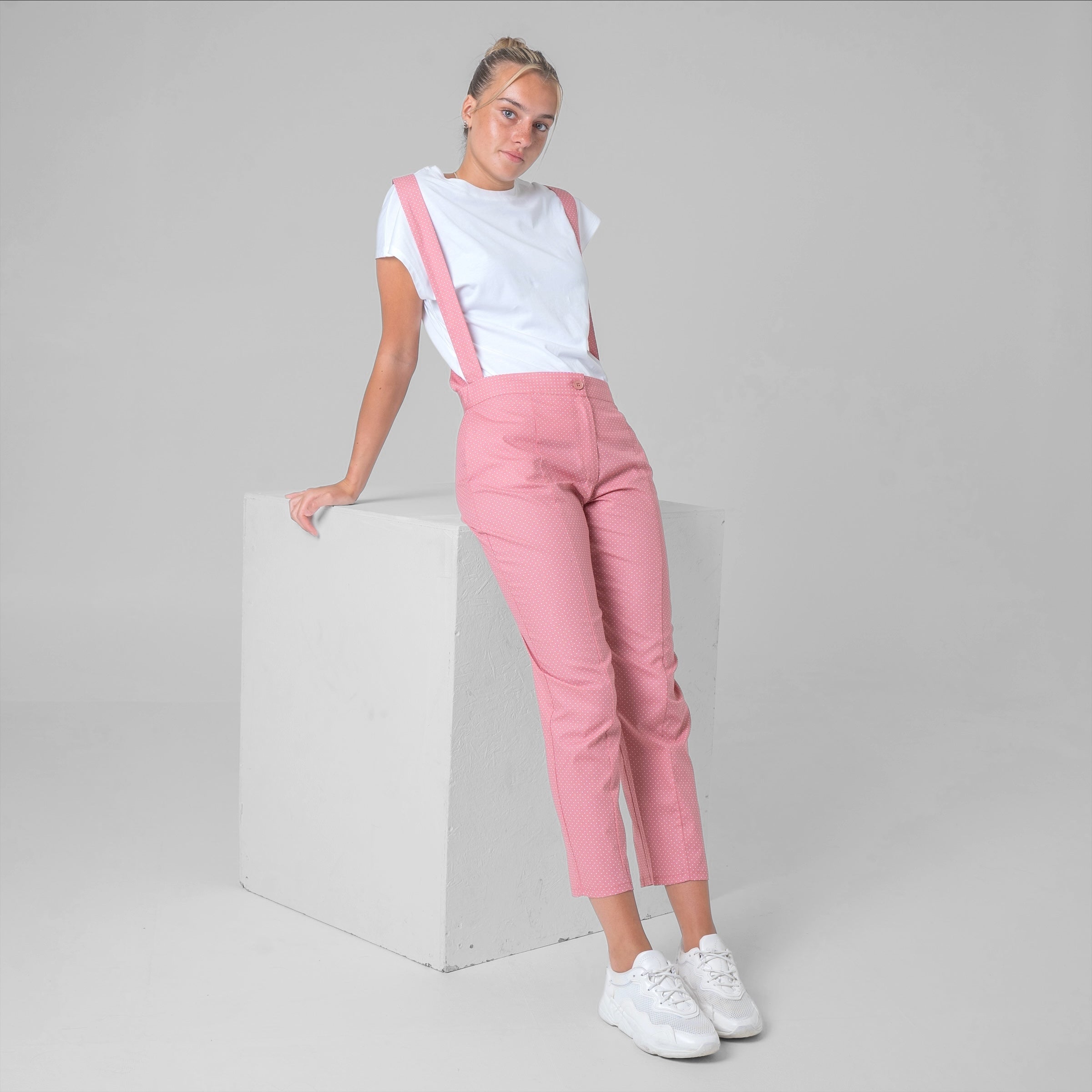 Pink cotton poplin suspender pants with white polka dots